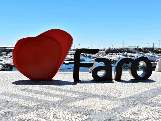 Image of Love Faro with a marina in the backdrop for Designer Shopping in Faro GlamPortugal